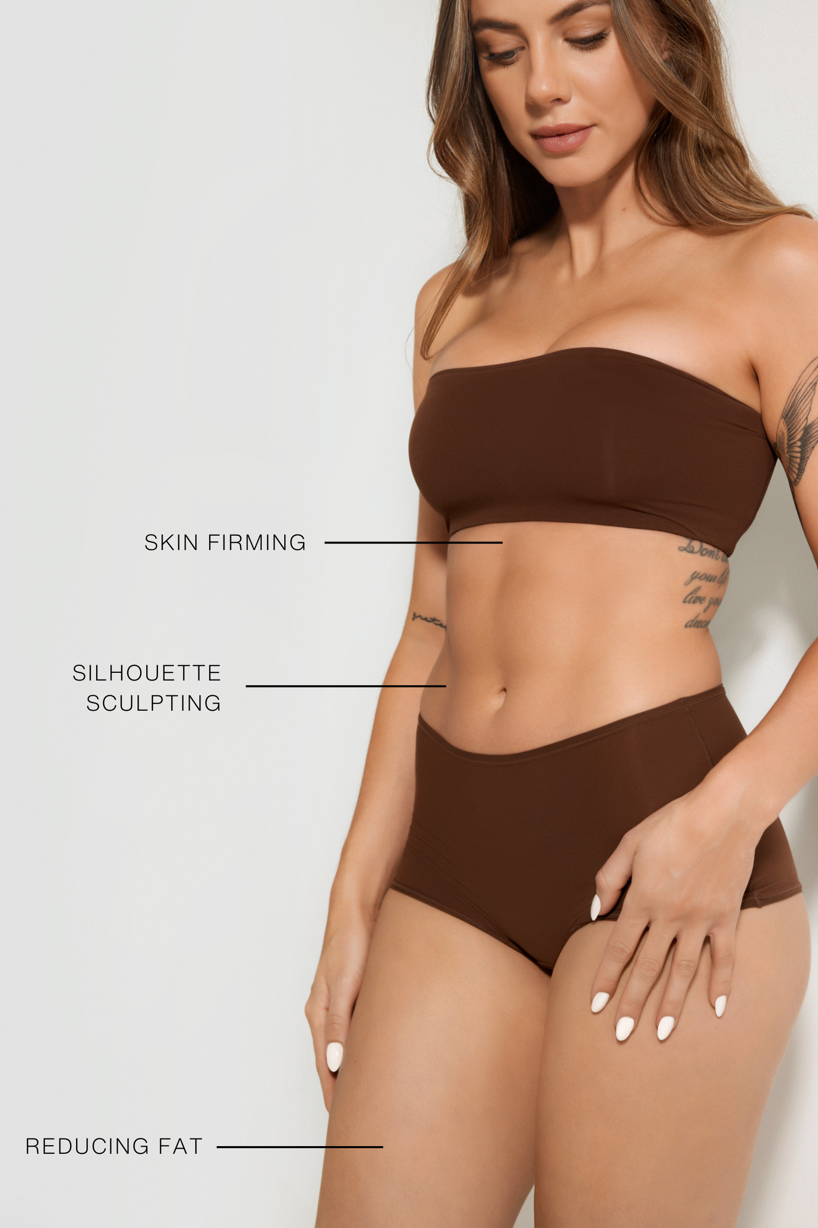 Woman with a defined body and toned skin after medical aesthetic body care treatments for body sculpting and skin toning.