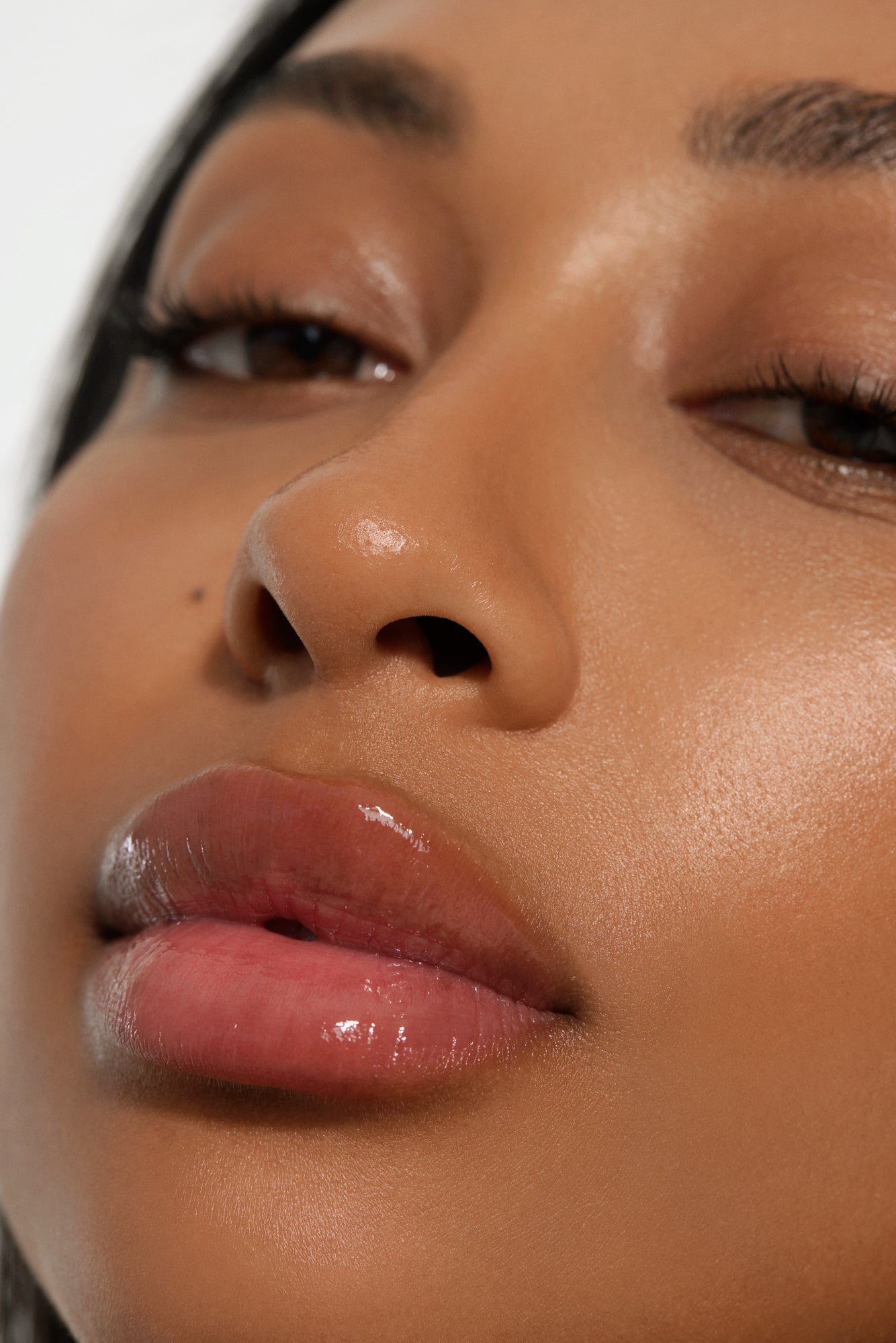 Close-up of a woman's plumped lips after lip injections, showcasing the natural and effective results of cosmetic lip enhancement.